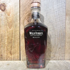 Wild Turkey Master's Keep Beacon bourbon with rich oak spice, dark fruit depth, and bold 118 proof character.